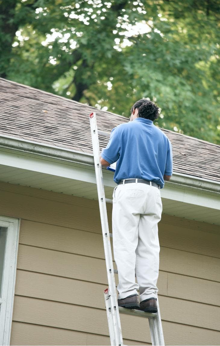 Insurance Adjuster Inspecting Roof | Roof Insurance Claims